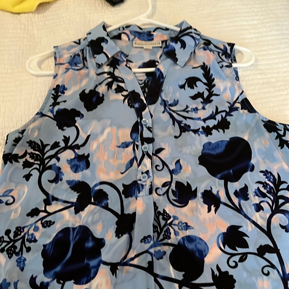 Collared and sleeveless